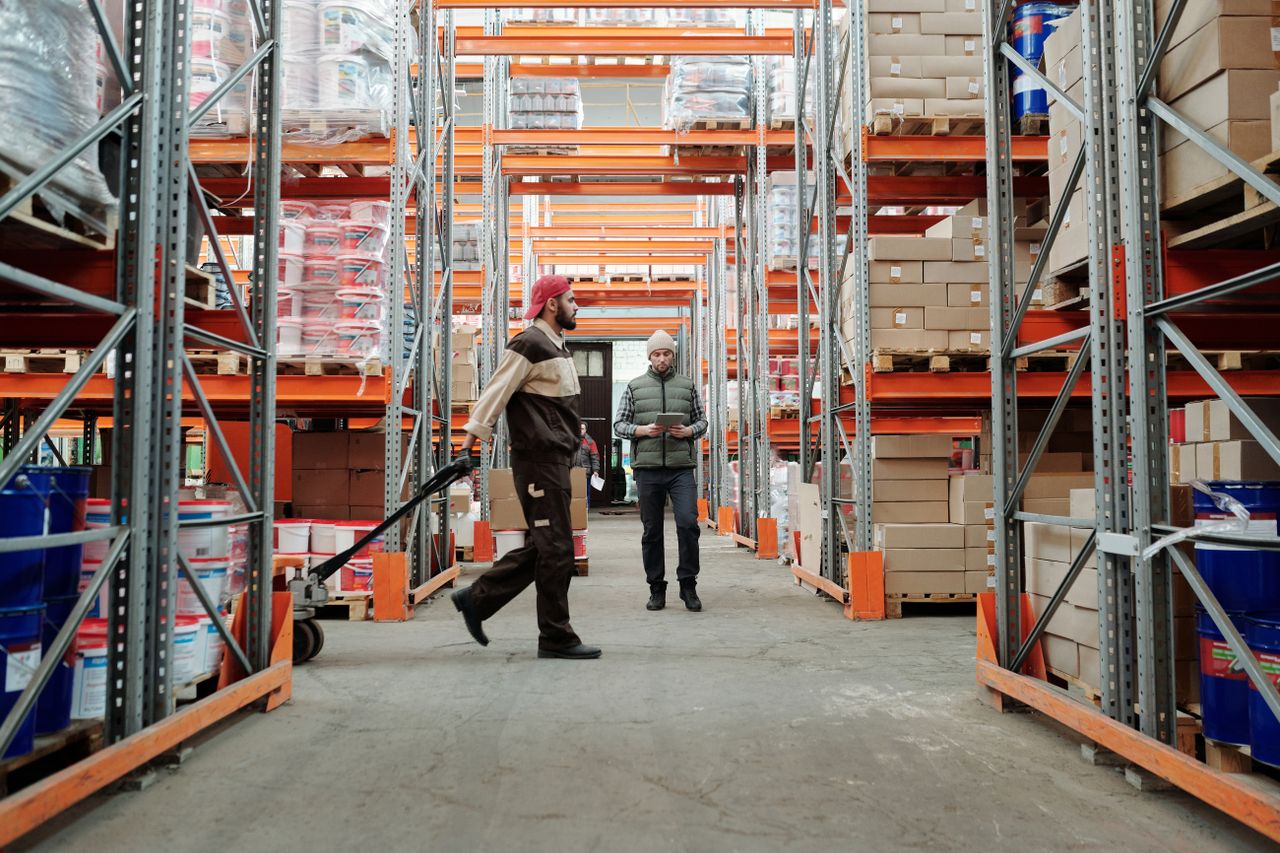 Warehouse workers coordinating a delivery, deployed by Shreeji Manpower Solution